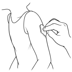 Hand rubbing child’s skin with alcohol wipe.
