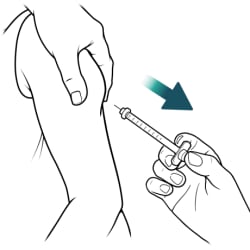 Hand pulling needle out in same direction it went in.