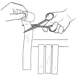 Roll of tape being cut into four strips with scissors.