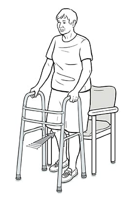 Person using walker backing up into chair so that chair touches back of legs.