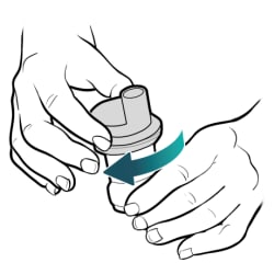 Hand twisting top of medicine cup to open it, with other hand holding bottom of cup.