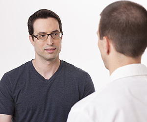 Patient talking to health care provider.